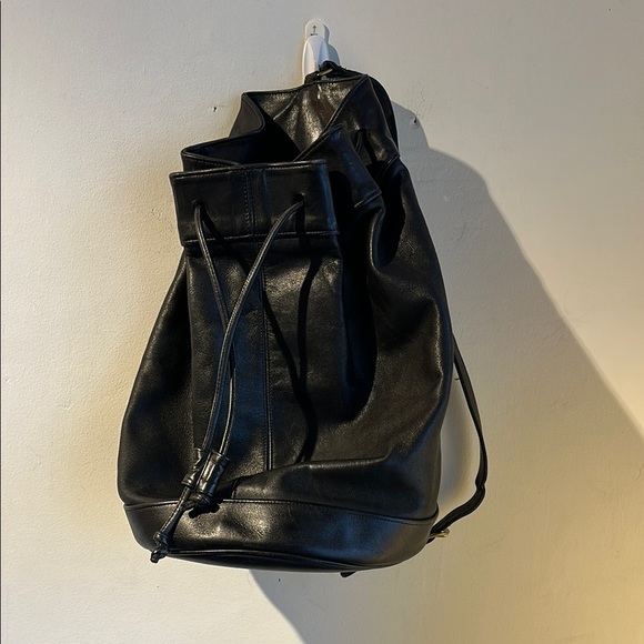 Coach Handbags - Vintage Coach Sling Bag Black Leather  Backpack